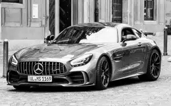 grayscale photo of mercedes benz coupe