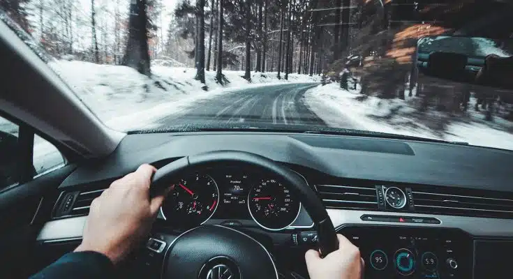 person driving Volkswagen vehicle